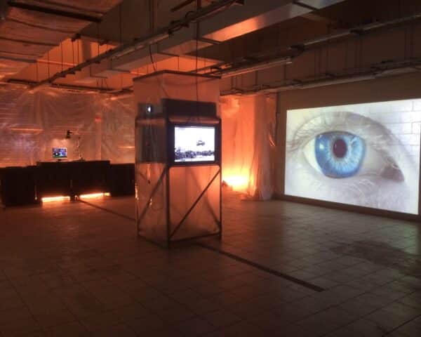 Projectors being used in a room
